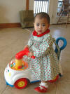 Taken 12/10/2006 with her new "car".